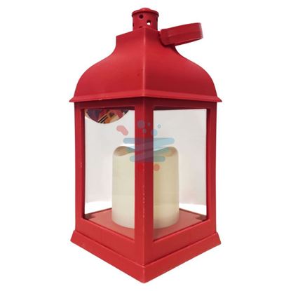 Lanterna rossa Dealo con LED accesa su tavola decorata per il Natale