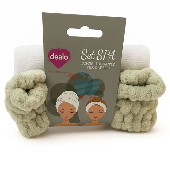 "Close-up della texture morbida e assorbente della microfibra del set spa Dealo